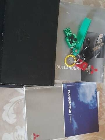 Сірий Міцубісі Аутлендер, об'ємом двигуна 1.97 л та пробігом 197 тис. км за 8999 $, фото 12 на Automoto.ua