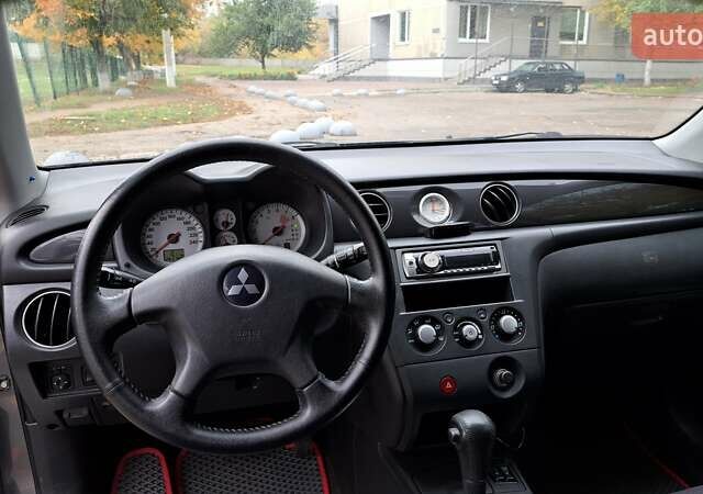Міцубісі Аутлендер 2007 у Харкові на Automoto.ua Сірий Міцубісі Аутлендер, об'ємом двигуна 2.38 л та пробігом 283 тис. км за 6000 $, фото 7 на Automoto.ua