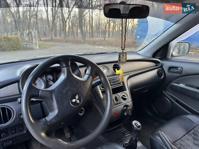 Серый Мицубиси Аутлендер, объемом двигателя 2 л и пробегом 415 тыс. км за 4699 $, фото 8 на Automoto.ua