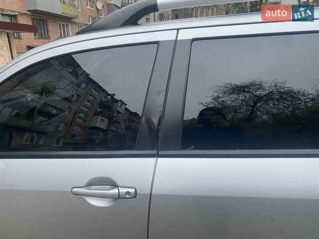 Серый Мицубиси Аутлендер, объемом двигателя 2 л и пробегом 255 тыс. км за 5600 $, фото 11 на Automoto.ua
