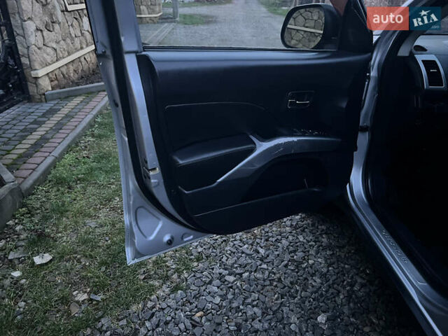 Серый Мицубиси Аутлендер, объемом двигателя 2.4 л и пробегом 236 тыс. км за 7600 $, фото 30 на Automoto.ua