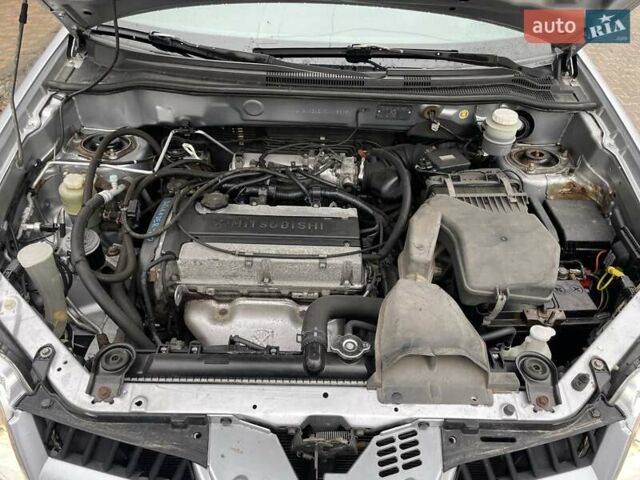 Серый Мицубиси Аутлендер, объемом двигателя 2 л и пробегом 270 тыс. км за 7000 $, фото 13 на Automoto.ua
