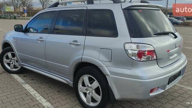 Сірий Міцубісі Аутлендер, об'ємом двигуна 2.4 л та пробігом 170 тис. км за 6400 $, фото 13 на Automoto.ua