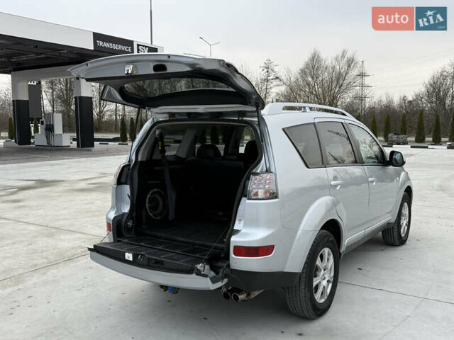 Серый Мицубиси Аутлендер, объемом двигателя 2 л и пробегом 299 тыс. км за 7750 $, фото 35 на Automoto.ua