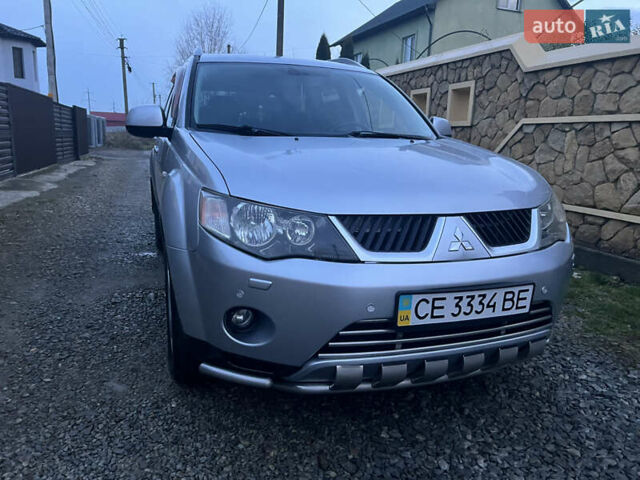 Серый Мицубиси Аутлендер, объемом двигателя 2.4 л и пробегом 236 тыс. км за 7600 $, фото 3 на Automoto.ua