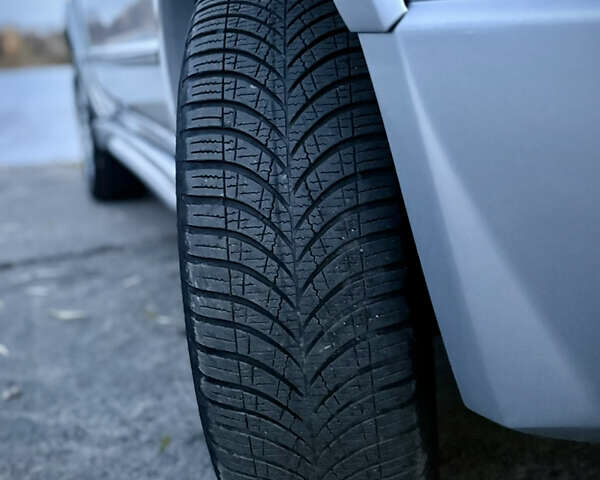 Серый Мицубиси Аутлендер, объемом двигателя 2.38 л и пробегом 238 тыс. км за 7450 $, фото 3 на Automoto.ua