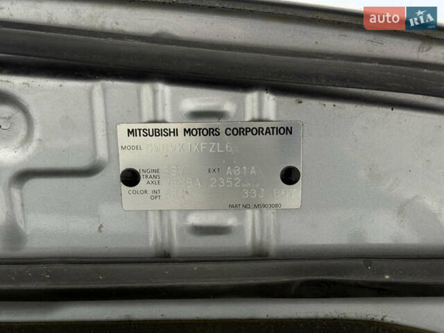 Серый Мицубиси Аутлендер, объемом двигателя 2 л и пробегом 299 тыс. км за 7750 $, фото 47 на Automoto.ua
