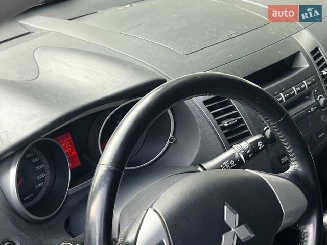 Серый Мицубиси Аутлендер, объемом двигателя 2.4 л и пробегом 130 тыс. км за 7940 $, фото 28 на Automoto.ua