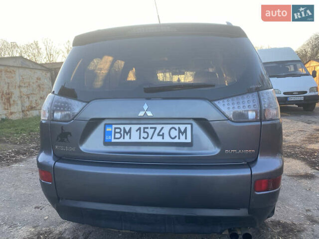 Серый Мицубиси Аутлендер, объемом двигателя 1.97 л и пробегом 257 тыс. км за 9000 $, фото 6 на Automoto.ua