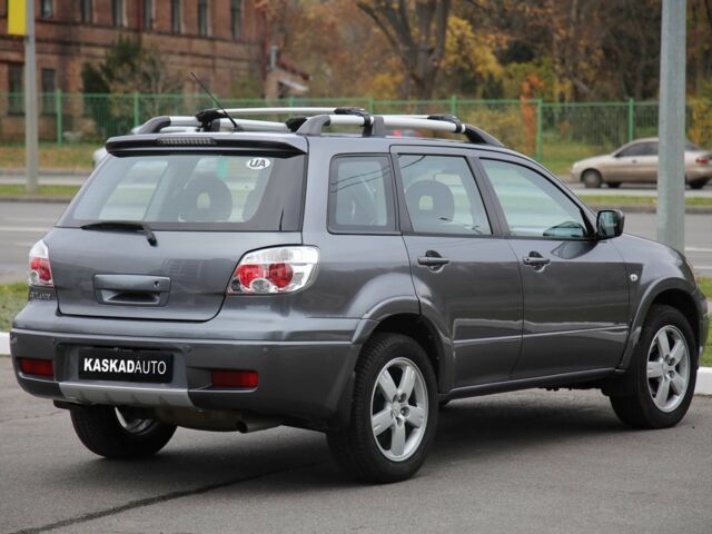 Серый Мицубиси Аутлендер, объемом двигателя 2.4 л и пробегом 240 тыс. км за 7200 $, фото 5 на Automoto.ua