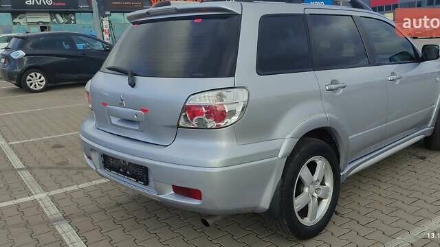 Сірий Міцубісі Аутлендер, об'ємом двигуна 2.4 л та пробігом 170 тис. км за 6400 $, фото 12 на Automoto.ua
