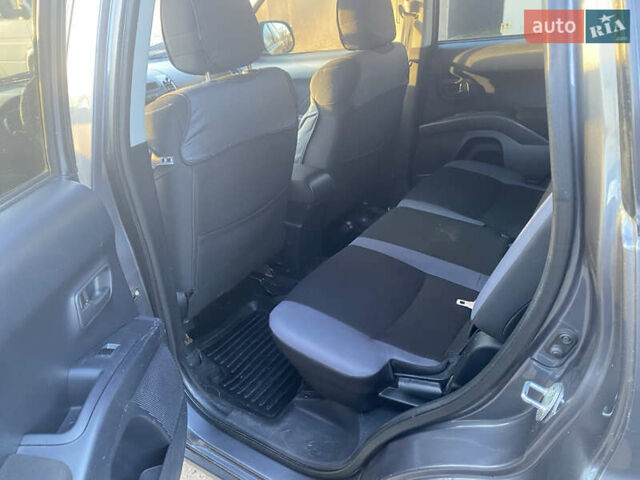 Серый Мицубиси Аутлендер, объемом двигателя 1.97 л и пробегом 257 тыс. км за 9000 $, фото 15 на Automoto.ua