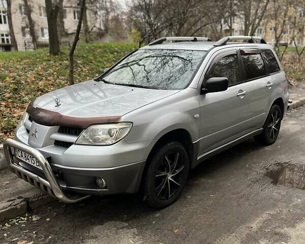 Сірий Міцубісі Аутлендер, об'ємом двигуна 2 л та пробігом 332 тис. км за 6200 $, фото 6 на Automoto.ua
