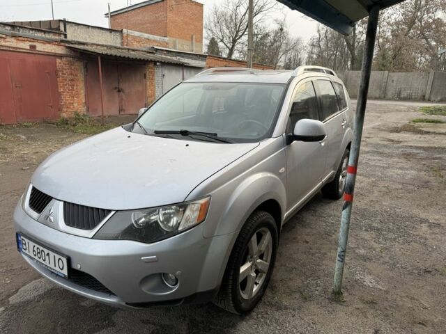 Серый Мицубиси Аутлендер, объемом двигателя 2.4 л и пробегом 330 тыс. км за 9000 $, фото 4 на Automoto.ua