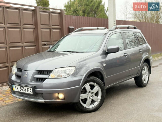 Серый Мицубиси Аутлендер, объемом двигателя 2.4 л и пробегом 240 тыс. км за 6900 $, фото 3 на Automoto.ua