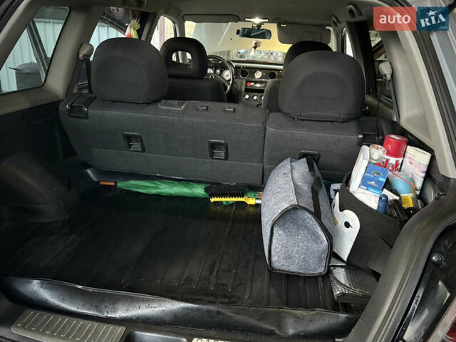 Серый Мицубиси Аутлендер, объемом двигателя 2.38 л и пробегом 238 тыс. км за 7450 $, фото 58 на Automoto.ua