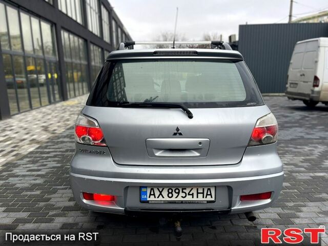 Серый Мицубиси Аутлендер, объемом двигателя 2.4 л и пробегом 280 тыс. км за 5800 $, фото 12 на Automoto.ua