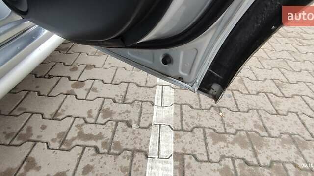 Серый Мицубиси Аутлендер, объемом двигателя 2.4 л и пробегом 163 тыс. км за 6700 $, фото 28 на Automoto.ua