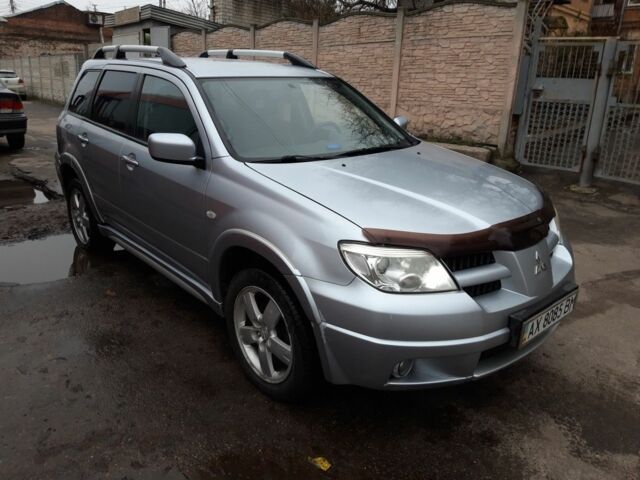 Сірий Міцубісі Аутлендер, об'ємом двигуна 2.4 л та пробігом 190 тис. км за 6000 $, фото 3 на Automoto.ua