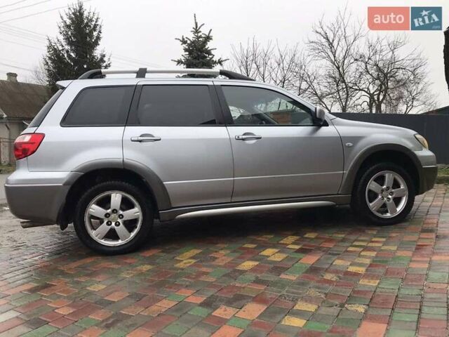 Сірий Міцубісі Аутлендер, об'ємом двигуна 2.4 л та пробігом 167 тис. км за 6400 $, фото 3 на Automoto.ua