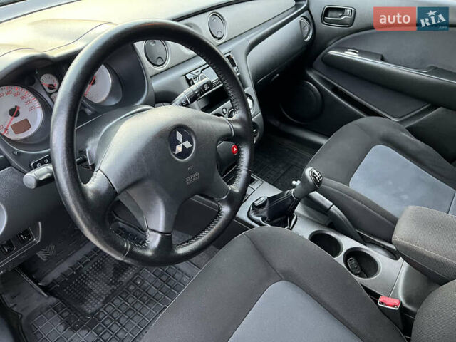 Сірий Міцубісі Аутлендер, об'ємом двигуна 2 л та пробігом 192 тис. км за 6400 $, фото 43 на Automoto.ua