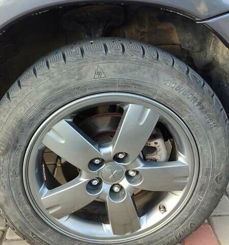 Серый Мицубиси Аутлендер, объемом двигателя 2.38 л и пробегом 189 тыс. км за 7600 $, фото 15 на Automoto.ua