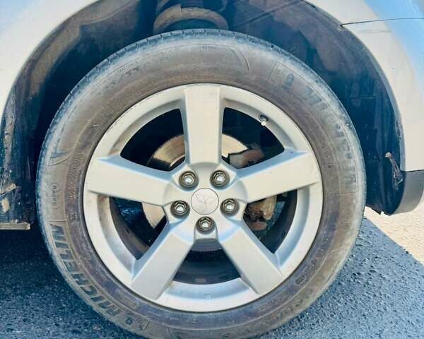 Серый Мицубиси Аутлендер, объемом двигателя 3 л и пробегом 188 тыс. км за 10000 $, фото 10 на Automoto.ua