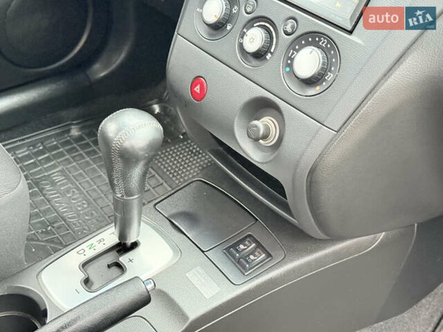 Серый Мицубиси Аутлендер, объемом двигателя 2.4 л и пробегом 240 тыс. км за 6900 $, фото 34 на Automoto.ua