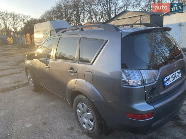 Серый Мицубиси Аутлендер, объемом двигателя 1.97 л и пробегом 257 тыс. км за 9000 $, фото 3 на Automoto.ua