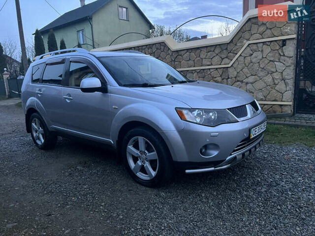 Серый Мицубиси Аутлендер, объемом двигателя 2.4 л и пробегом 236 тыс. км за 7600 $, фото 5 на Automoto.ua