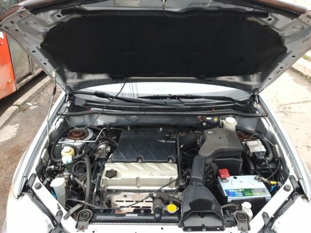 Сірий Міцубісі Аутлендер, об'ємом двигуна 2.4 л та пробігом 190 тис. км за 6000 $, фото 8 на Automoto.ua