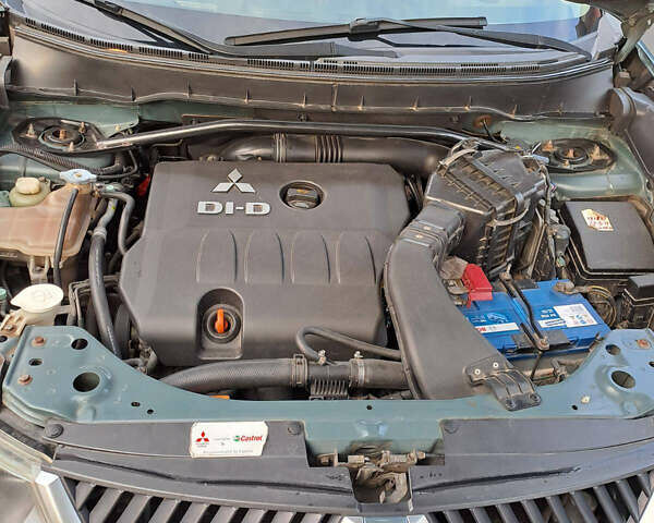 Серый Мицубиси Аутлендер, объемом двигателя 2 л и пробегом 230 тыс. км за 9500 $, фото 11 на Automoto.ua