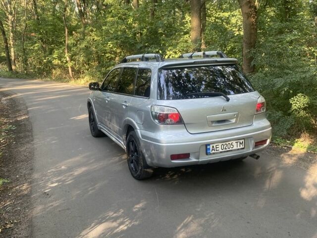 Сірий Міцубісі Аутлендер, об'ємом двигуна 2.4 л та пробігом 307 тис. км за 6700 $, фото 3 на Automoto.ua