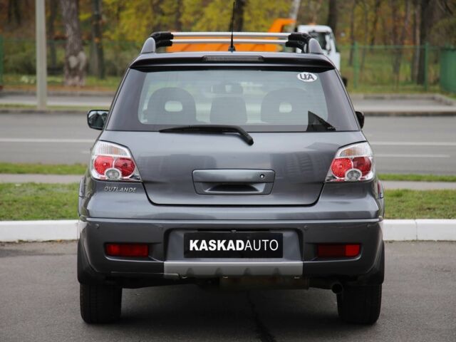 Серый Мицубиси Аутлендер, объемом двигателя 2.4 л и пробегом 240 тыс. км за 7200 $, фото 4 на Automoto.ua