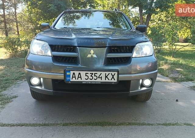 Сірий Міцубісі Аутлендер, об'ємом двигуна 2 л та пробігом 348 тис. км за 6500 $, фото 12 на Automoto.ua