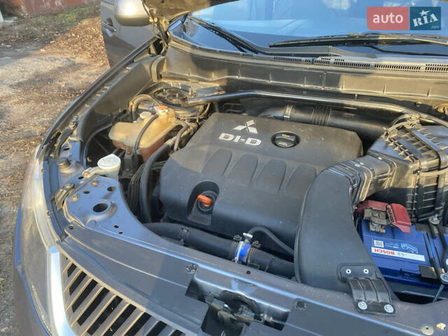 Серый Мицубиси Аутлендер, объемом двигателя 1.97 л и пробегом 257 тыс. км за 9000 $, фото 13 на Automoto.ua