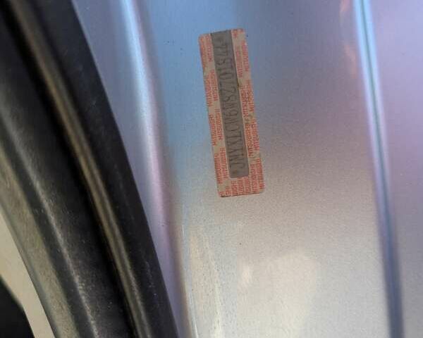 Серый Мицубиси Аутлендер, объемом двигателя 3 л и пробегом 216 тыс. км за 10600 $, фото 37 на Automoto.ua