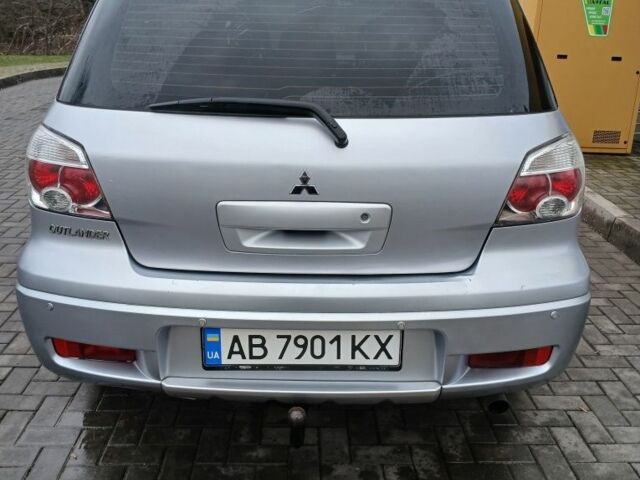 Серый Мицубиси Аутлендер, объемом двигателя 2.4 л и пробегом 300 тыс. км за 5900 $, фото 6 на Automoto.ua