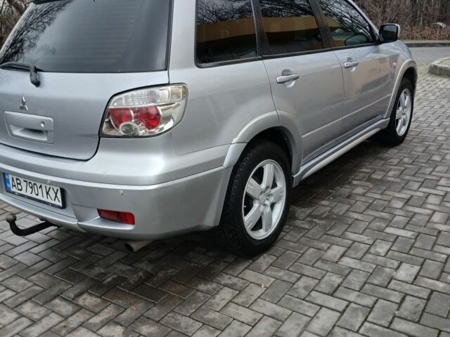 Серый Мицубиси Аутлендер, объемом двигателя 2.4 л и пробегом 300 тыс. км за 5900 $, фото 3 на Automoto.ua