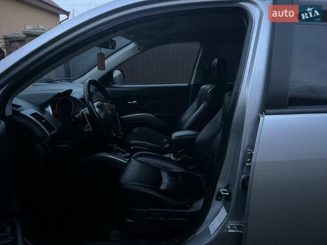 Серый Мицубиси Аутлендер, объемом двигателя 2.4 л и пробегом 236 тыс. км за 7600 $, фото 35 на Automoto.ua