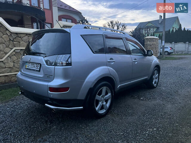 Серый Мицубиси Аутлендер, объемом двигателя 2.4 л и пробегом 236 тыс. км за 7600 $, фото 6 на Automoto.ua