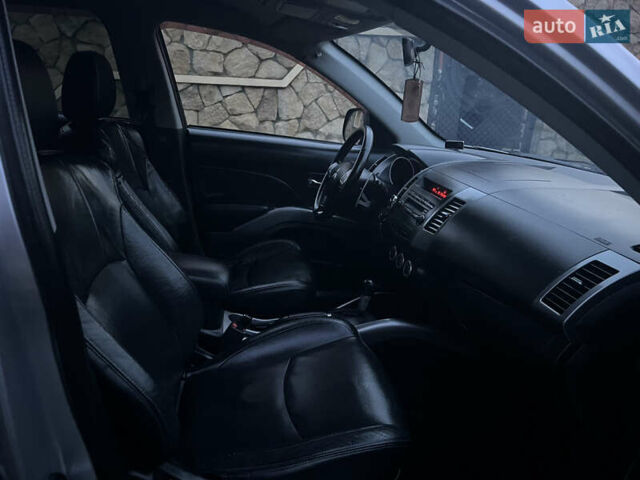 Серый Мицубиси Аутлендер, объемом двигателя 2.4 л и пробегом 236 тыс. км за 7600 $, фото 17 на Automoto.ua