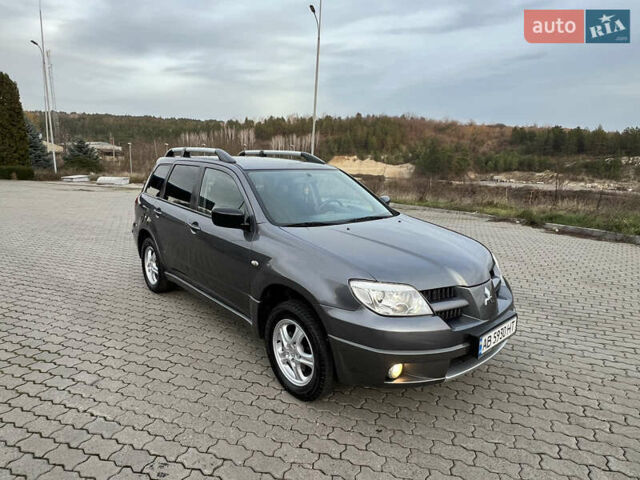 Серый Мицубиси Аутлендер, объемом двигателя 2 л и пробегом 196 тыс. км за 6450 $, фото 4 на Automoto.ua