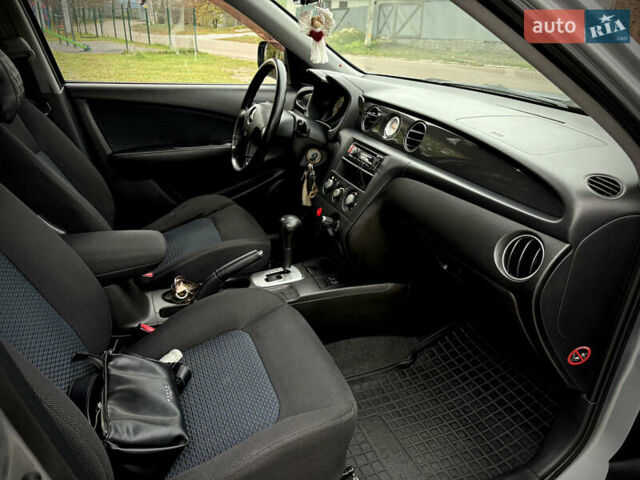 Серый Мицубиси Аутлендер, объемом двигателя 2.38 л и пробегом 238 тыс. км за 7450 $, фото 25 на Automoto.ua