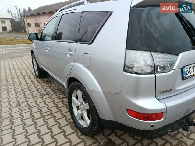 Серый Мицубиси Аутлендер, объемом двигателя 2 л и пробегом 332 тыс. км за 7650 $, фото 6 на Automoto.ua