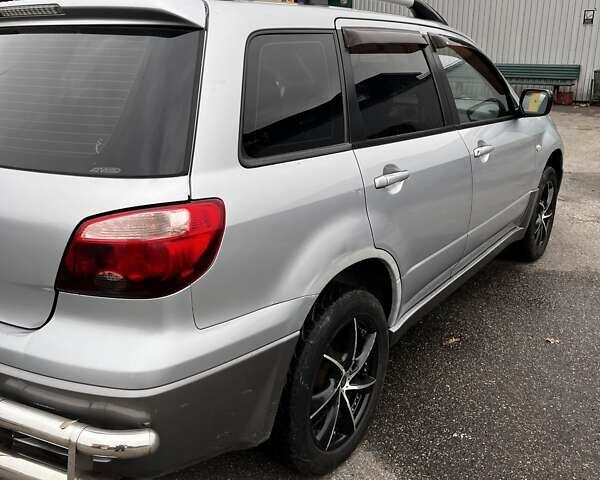 Сірий Міцубісі Аутлендер, об'ємом двигуна 2 л та пробігом 332 тис. км за 6200 $, фото 17 на Automoto.ua