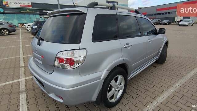 Сірий Міцубісі Аутлендер, об'ємом двигуна 2.4 л та пробігом 170 тис. км за 6400 $, фото 20 на Automoto.ua