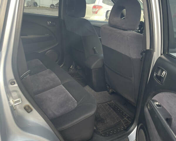 Сірий Міцубісі Аутлендер, об'ємом двигуна 2.4 л та пробігом 166 тис. км за 6700 $, фото 6 на Automoto.ua