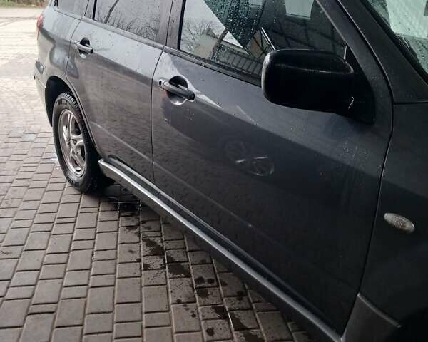 Сірий Міцубісі Аутлендер, об'ємом двигуна 2 л та пробігом 191 тис. км за 6500 $, фото 15 на Automoto.ua