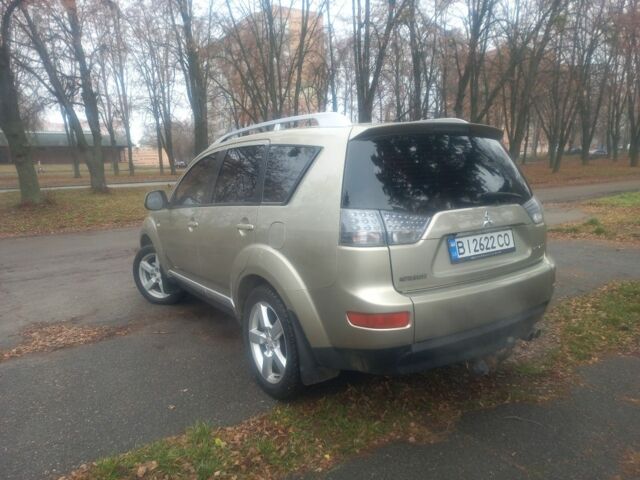 Сірий Міцубісі Аутлендер, об'ємом двигуна 2 л та пробігом 245 тис. км за 8600 $, фото 2 на Automoto.ua